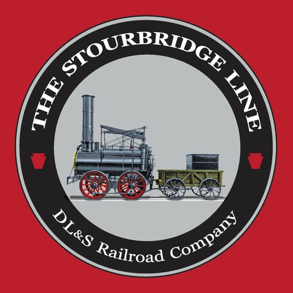 Runaway Train Brewery logo: a vintage train with red wheels inside a black and white circle.